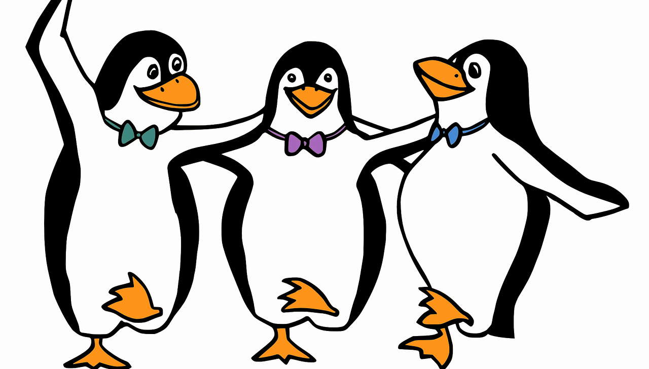 Three drawn happy penguins with colorful bow ties dance and hold each other by the shoulders.
